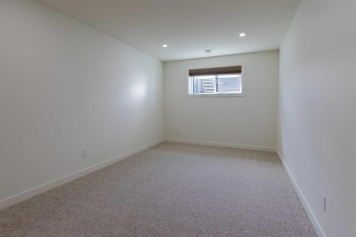 306 Bridge Crossing Close, Raymond, AB - Indoor Photo Showing Other Room