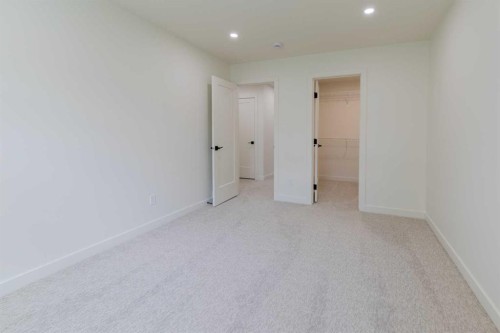306 Bridge Crossing Close, Raymond, AB - Indoor Photo Showing Other Room