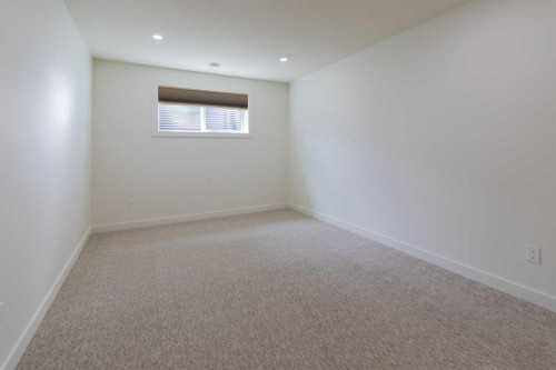 306 Bridge Crossing Close, Raymond, AB - Indoor Photo Showing Other Room