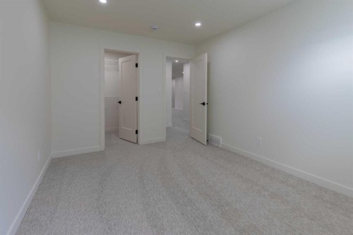 306 Bridge Crossing Close, Raymond, AB - Indoor Photo Showing Other Room