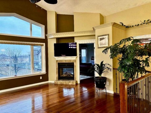 314 Coulee Springs Terrace South, Lethbridge, AB - Indoor With Fireplace
