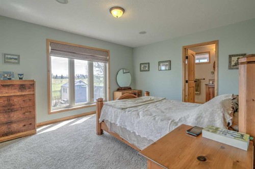 100 Canyoncrest Point West, Lethbridge, AB - Indoor Photo Showing Bedroom