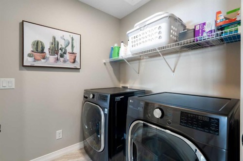 700 Seton Circle Se, Calgary, AB - Indoor Photo Showing Laundry Room