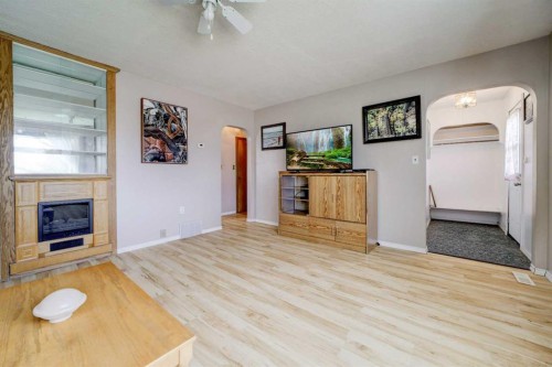 307 Grey Street, Granum, AB - Indoor Photo Showing Living Room With Fireplace