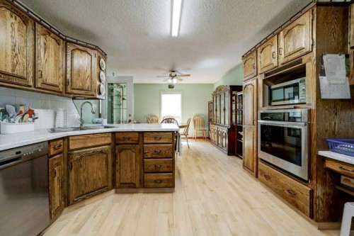 31 Red Crow Boulevard West, Lethbridge, AB - Indoor Photo Showing Kitchen With Double Sink
