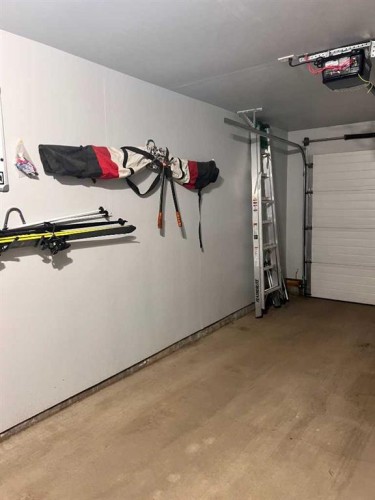 2-153 Silkstone, Lethbridge, AB - Indoor Photo Showing Garage