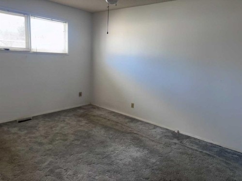 409 Centre Avenue Ne, Milk River, AB - Indoor Photo Showing Other Room