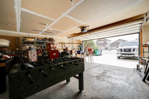 29 Coalbanks Link West, Lethbridge, AB - Indoor Photo Showing Garage
