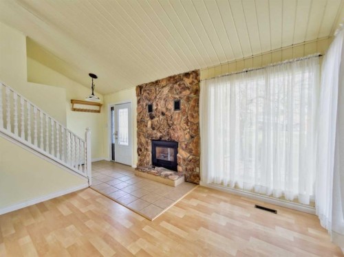 13553 18 Avenue, Blairmore, AB - Indoor With Fireplace