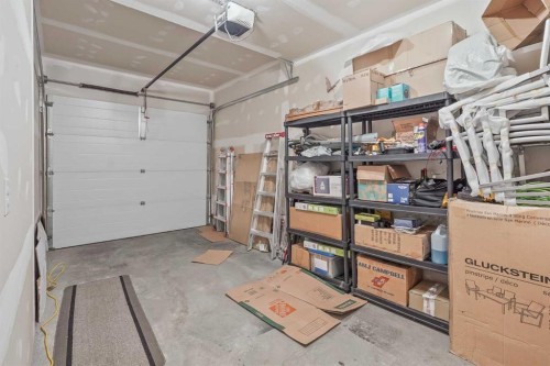 2-422 Highlands Boulevard West, Lethbridge, AB - Indoor Photo Showing Garage