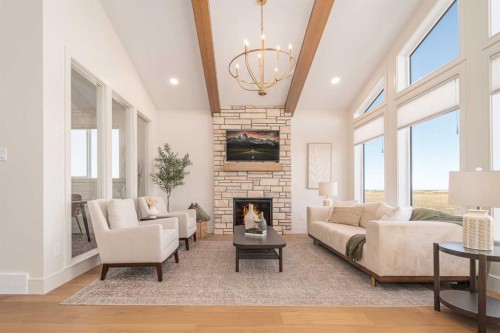 343 Blackwolf Boulevard North, Lethbridge, AB - Indoor Photo Showing Living Room With Fireplace