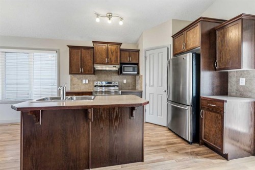 306 Keystone Lane West, Lethbridge, AB - Indoor Photo Showing Kitchen With Double Sink