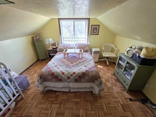 95070 Range Road 18-3, Rural Taber, M.D. Of, AB - Indoor Photo Showing Bedroom