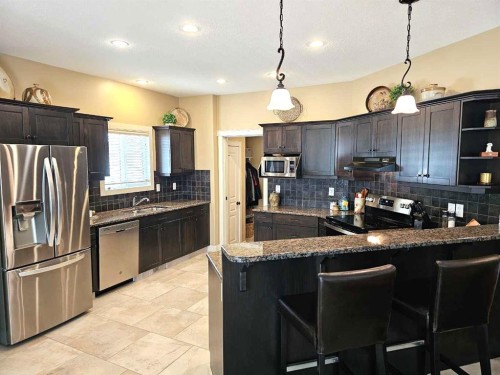 230 Firelight Crescent West, Lethbridge, AB - Indoor Photo Showing Kitchen With Double Sink With Upgraded Kitchen