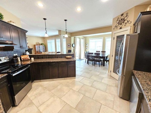 230 Firelight Crescent West, Lethbridge, AB - Indoor Photo Showing Kitchen With Upgraded Kitchen