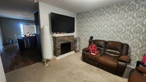 86-53 Keystone Terrace West, Lethbridge, AB - Indoor With Fireplace