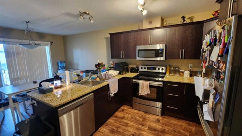 86-53 Keystone Terrace West, Lethbridge, AB - Indoor Photo Showing Kitchen With Stainless Steel Kitchen