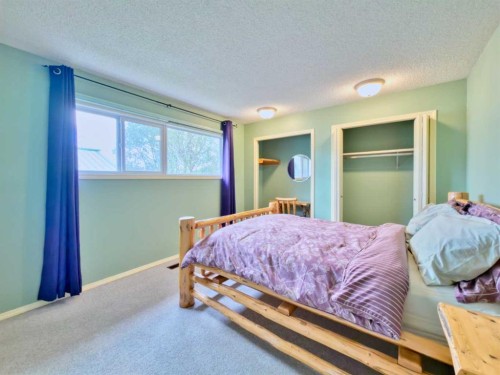 8126 20 Avenue, Coleman, AB - Indoor Photo Showing Bedroom