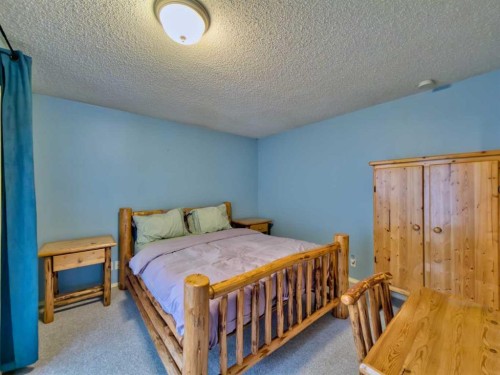8126 20 Avenue, Coleman, AB - Indoor Photo Showing Bedroom