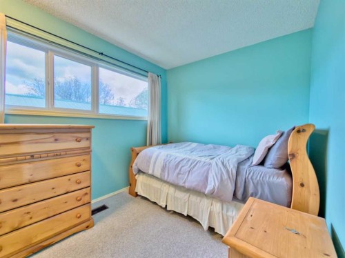 8126 20 Avenue, Coleman, AB - Indoor Photo Showing Bedroom