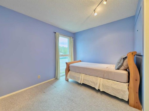 8126 20 Avenue, Coleman, AB - Indoor Photo Showing Bedroom
