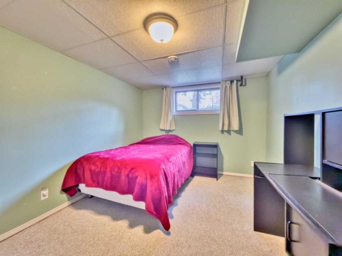 8126 20 Avenue, Coleman, AB - Indoor Photo Showing Bedroom