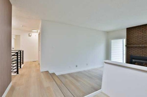 418 Dieppe Boulevard South, Lethbridge, AB - Indoor Photo Showing Other Room With Fireplace