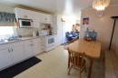 1124 1 Ave, Vauxhall, AB  - Indoor Photo Showing Kitchen With Double Sink 