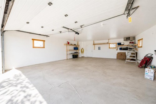 94075 Range Road 115, Burdett, AB - Indoor Photo Showing Garage