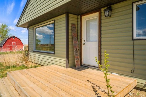 94075 Range Road 115, Burdett, AB - Outdoor With Deck Patio Veranda With Exterior