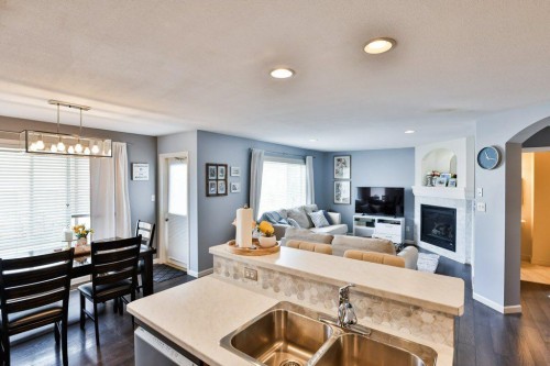 573 Squamish Lane West, Lethbridge, AB - Indoor With Fireplace
