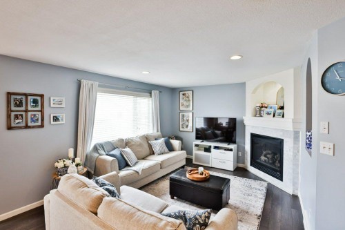 573 Squamish Lane West, Lethbridge, AB - Indoor Photo Showing Living Room With Fireplace