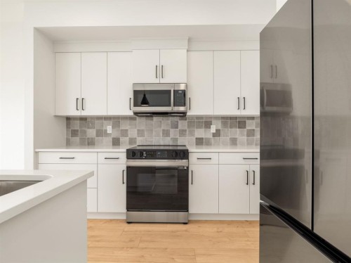 554 Malahat Green West, Lethbridge, AB - Indoor Photo Showing Kitchen With Upgraded Kitchen
