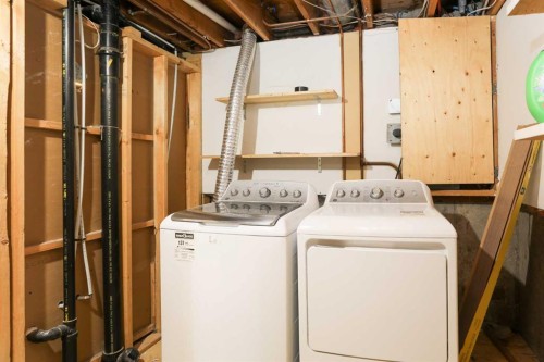 101 Temple Boulevard West, Lethbridge, AB - Indoor Photo Showing Laundry Room