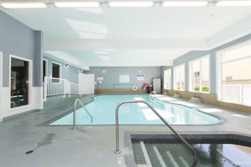 416-2020 32 Street South, Lethbridge, AB - Indoor Photo Showing Other Room With In Ground Pool