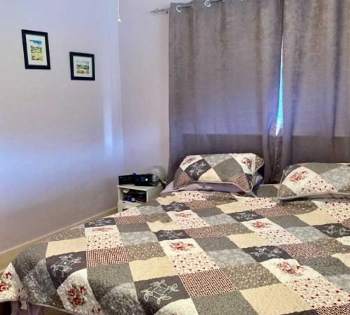 6525 21 Avenue, Coleman, AB - Indoor Photo Showing Bedroom