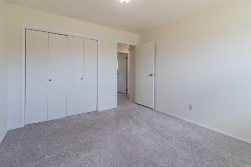 67 E 200 S, Raymond, AB - Indoor Photo Showing Other Room