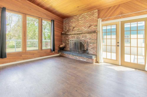67 E 200 S, Raymond, AB - Indoor With Fireplace