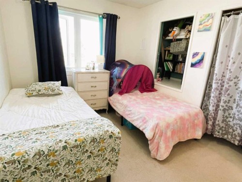 31 Schofield Place, Pincher Creek, AB - Indoor Photo Showing Bedroom