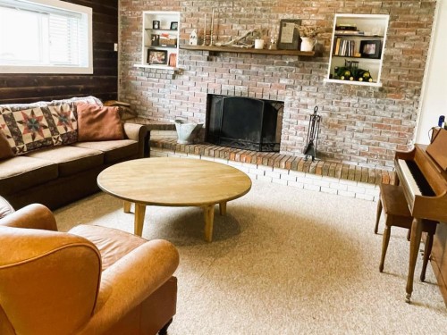 31 Schofield Place, Pincher Creek, AB - Indoor With Fireplace
