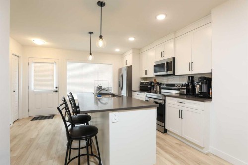 1508-210 Firelight Way West, Lethbridge, AB - Indoor Photo Showing Kitchen With Double Sink