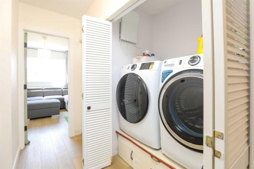 605 50 Avenue, Coalhurst, AB - Indoor Photo Showing Laundry Room