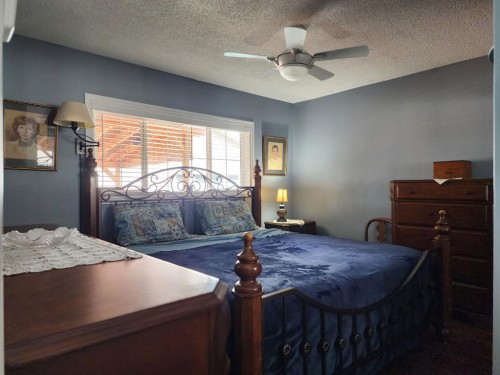 18 Willow Road, Claresholm, AB - Indoor Photo Showing Bedroom