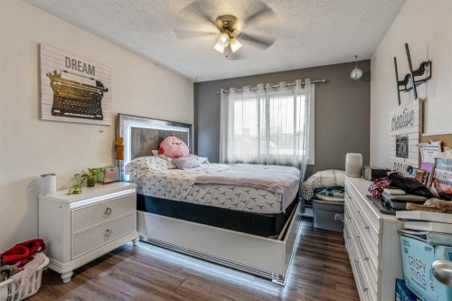 7-1739 St Edward Boulevard North, Lethbridge, AB - Indoor Photo Showing Bedroom