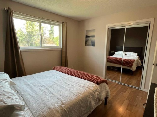 235S 50 West, Raymond, AB - Indoor Photo Showing Bedroom