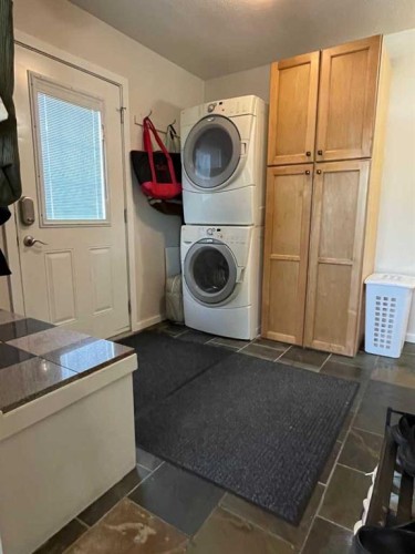 235S 50 West, Raymond, AB - Indoor Photo Showing Laundry Room