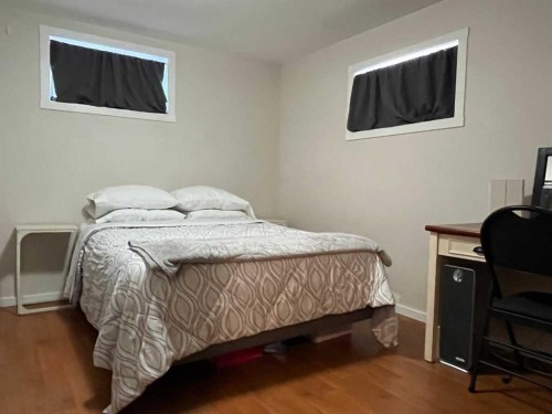 235S 50 West, Raymond, AB - Indoor Photo Showing Bedroom