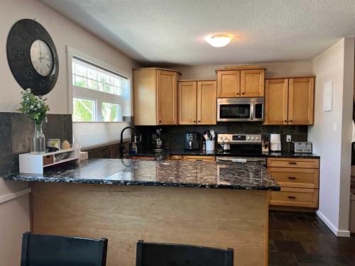 235S 50 West, Raymond, AB - Indoor Photo Showing Kitchen