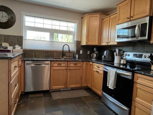 235S 50 West, Raymond, AB - Indoor Photo Showing Kitchen