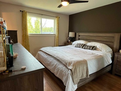 235S 50 West, Raymond, AB - Indoor Photo Showing Bedroom